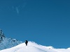 trekker walking over the snow mountain enroute bali pass