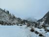 trekkers at snow covered har ki doon valley